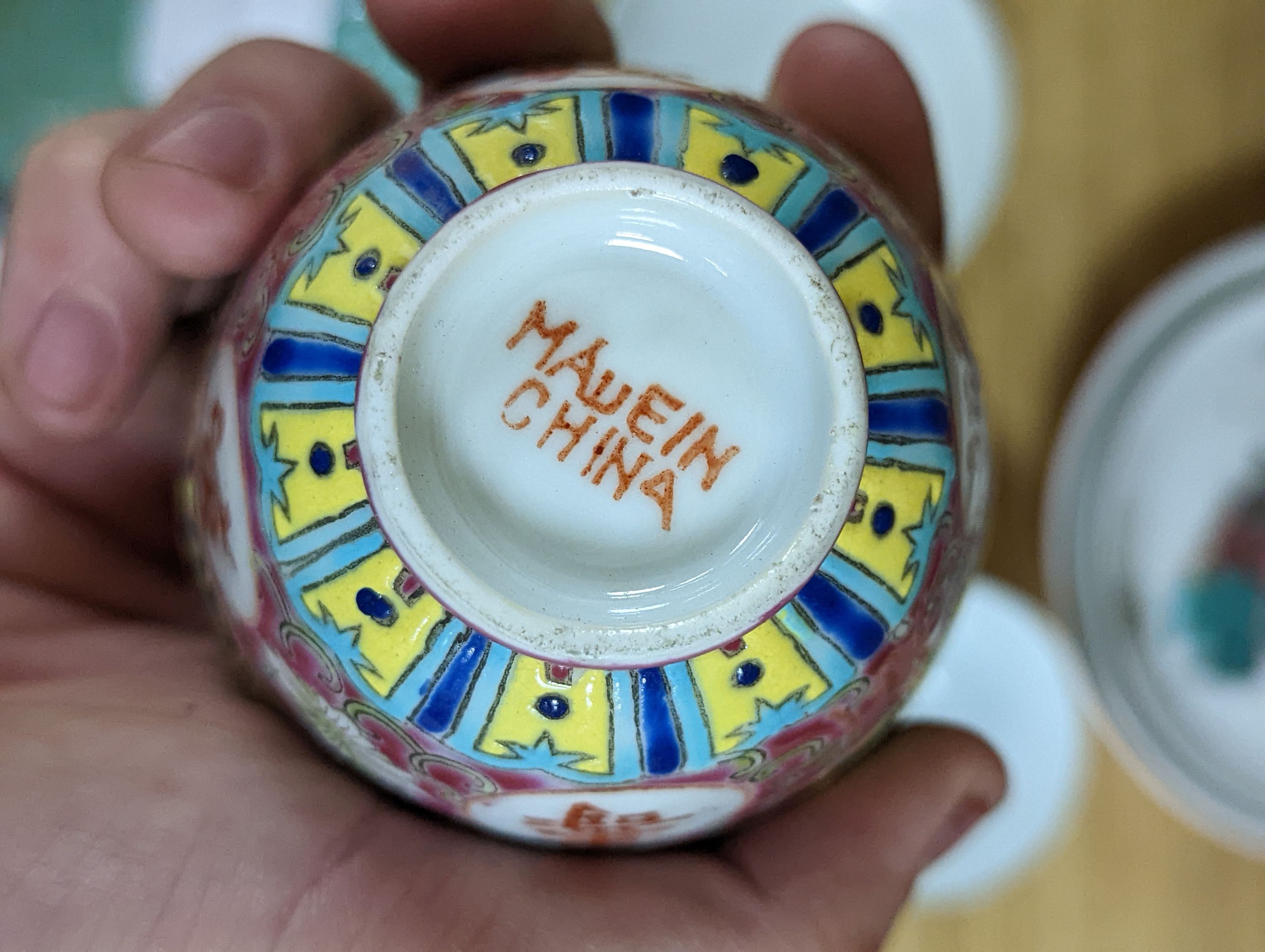 A group of Chinese enamelled porcelain plates, dishes, covers, cups and a vase